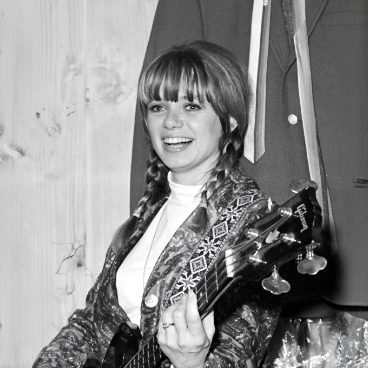 Ronnie Haran in the 1960s holding a guitar